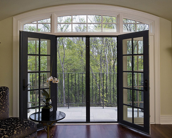 Retractable Legacy door screens, mounted on double-French doors.